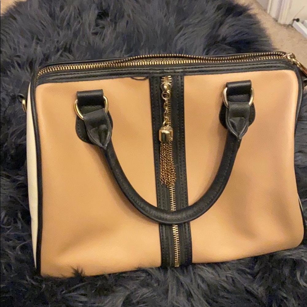 Multi colored Steve Madden. Medium sized.